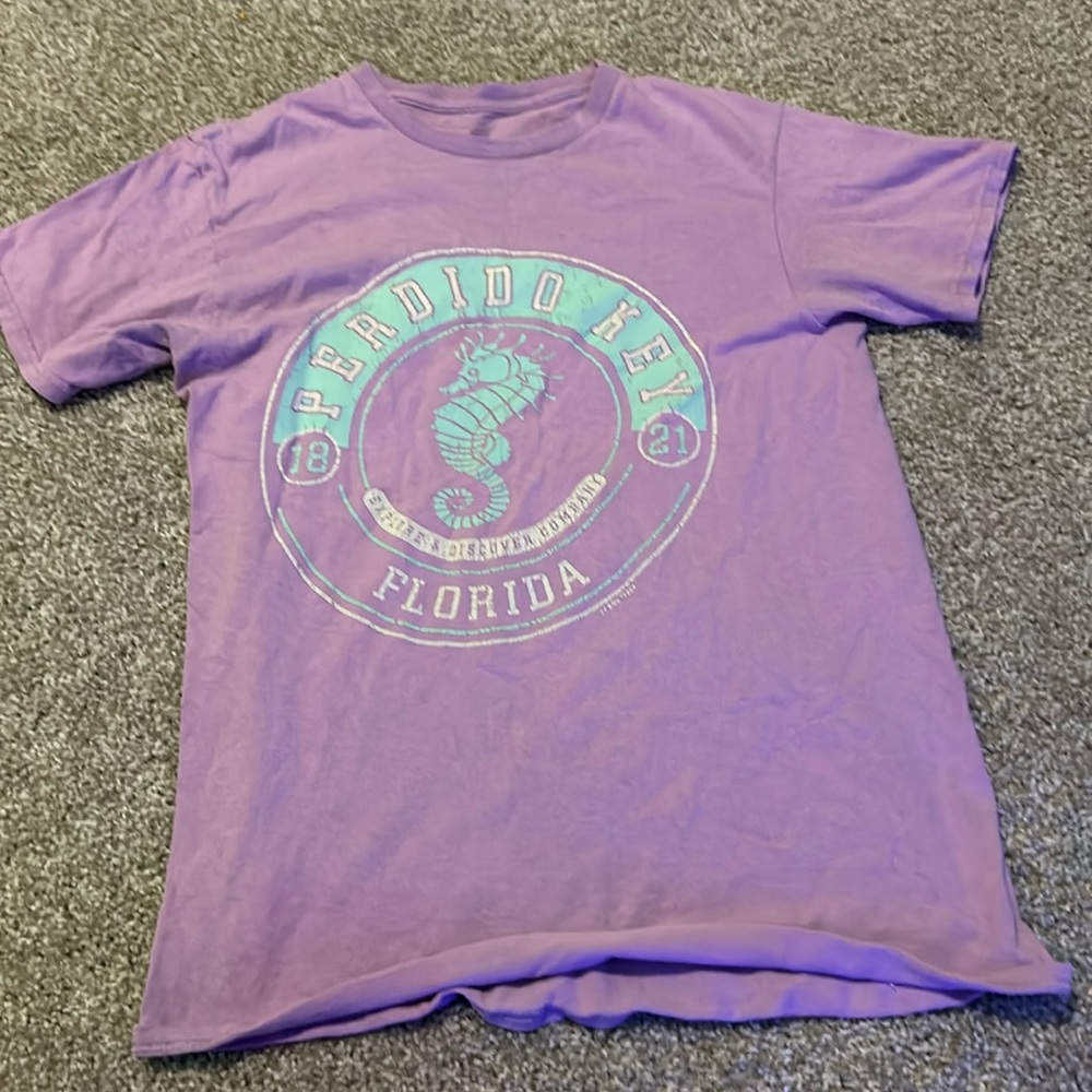 I’m selling an oversized purple T-shirt